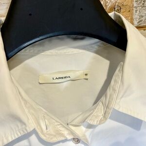 Woman’s Crisp White Lis Lareida Shirt with Modern Collar